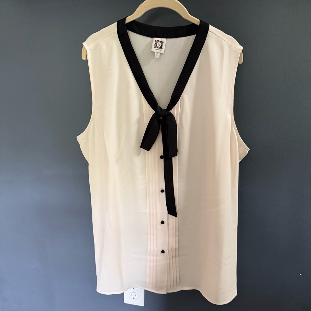 Anne Klein Elegant Sleeveless Button Up Cream Blouse with Black Bow Tie and Trim